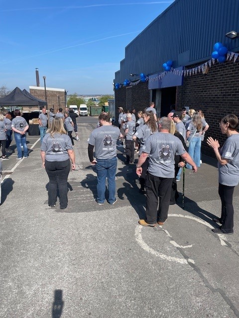 United Shield International employees celebrating 20-year anniversary